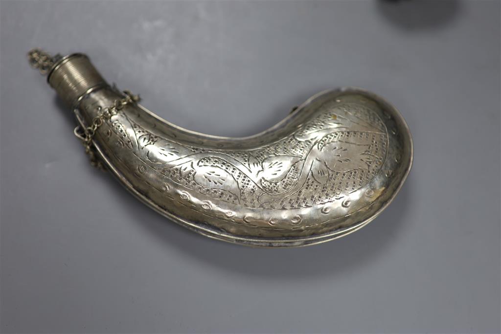 An 18th century Turkish flintlock pistol and an Eastern white metal powder flask